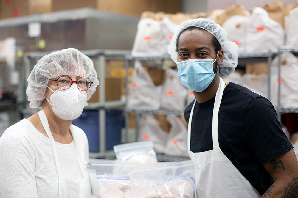 Irene Glowinski and Leonard Caldwell in the Food & Friends kitchen