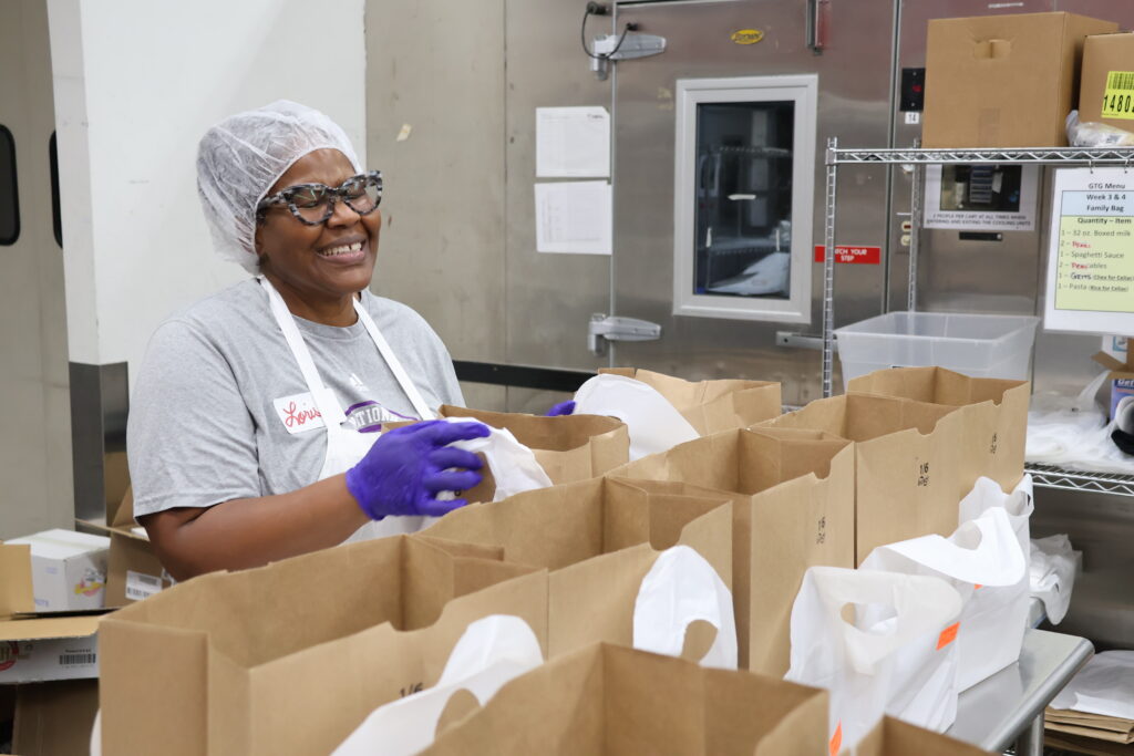 Loris Adams packages medically tailored groceries